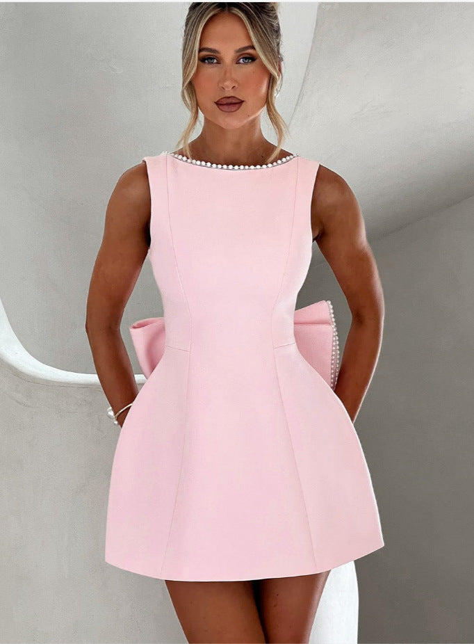 Robe élégante,dos parsemé de perles