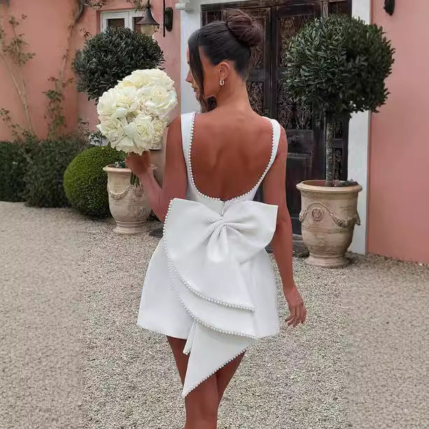 Robe élégante,dos parsemé de perles